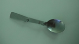 Folding stainless steel spoon